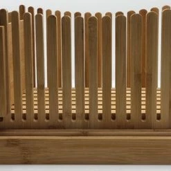 Stelleriana Broodsnijder Of Broodsnijmachine Van Bamboo Hout Als Hulpmiddel Bij Het Snijden Van Vers Zelf Gebakken Brood En Broodbakken. Bevat Een Broodplank/Snijplank Met Kruimelbak/Kruimelvanger. -WMF Shop 550x317 2