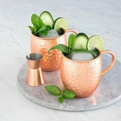 Navaris Moscow Mule Bekers - Set Van 4 - Cocktailbekers - Mok Voor Moscow Mule En Cocktails - Roestvrij Staal - 4 Koperen Mokken - Inclusief Jigger -WMF Shop 550x550 674