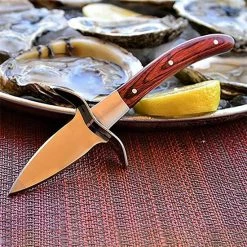 Oestermes Set Met Snijbestendige Handschoenen - Veilig Oesters Openen - Snijwerende Handschoenen - Keuken Accessoires - Bruin | Lobster Family 15 Oestermes Set Met Snijbestendige Handschoenen - Veilig Oesters Openen - Snijwerende Handschoenen - Keuken Accessoires - Bruin | Lobster Family -WMF Shop 550x550 701