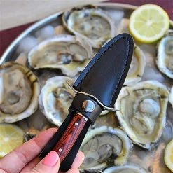Oestermes Set Met Snijbestendige Handschoenen - Veilig Oesters Openen - Snijwerende Handschoenen - Keuken Accessoires - Bruin | Lobster Family 16 Oestermes Set Met Snijbestendige Handschoenen - Veilig Oesters Openen - Snijwerende Handschoenen - Keuken Accessoires - Bruin | Lobster Family -WMF Shop 550x550 702
